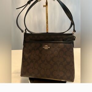 Coach signature leather black and brown cross body